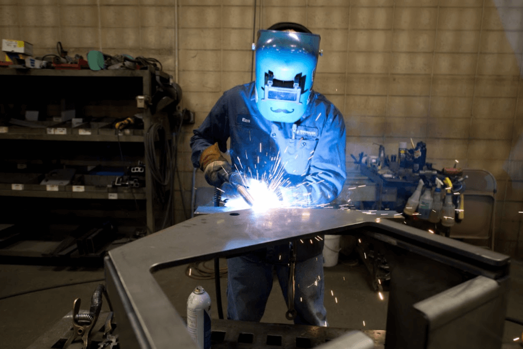 Man welding metal Man welding metal